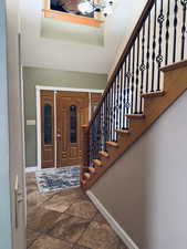 Entryway featuring a chandelier