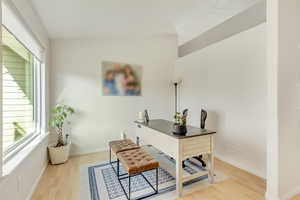 Home office featuring light wood-type flooring