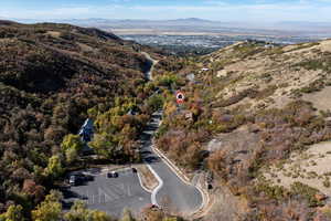 Birds eye view of property featuring a mountain view and Trail Head