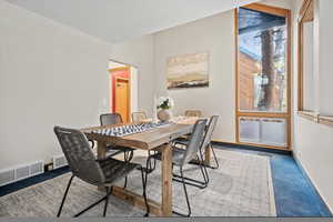 View of carpeted dining space