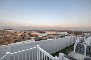 View of balcony at dusk