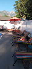 View of patio with a mountain view