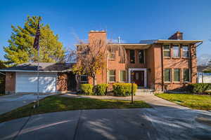 View of front of home featuring a garage