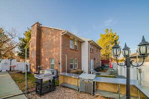 View of side of property featuring a patio