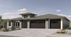 Prairie-style house featuring a garage*Rendering