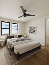 Bedroom featuring hardwood / wood-style floors and ceiling fan*Rendering