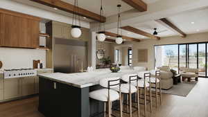 Gourmet Kitchen with white gas stovetop, a kitchen island with sink, built in fridge, beamed ceiling, and decorative light fixtures*Rendering