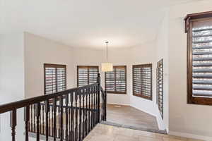 Hall featuring light wood-type flooring