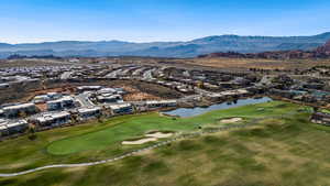 Aerial view featuring a water and mountain view