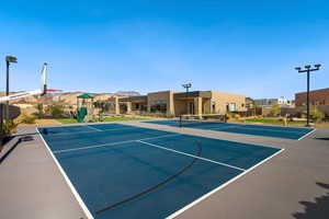 View of sport court with basketball hoop