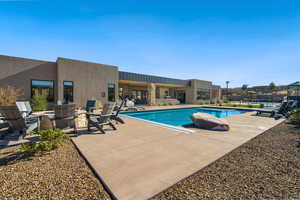 View of pool featuring a patio area