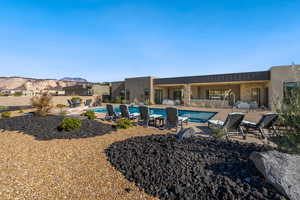 View of swimming pool featuring a patio area and a mountain view