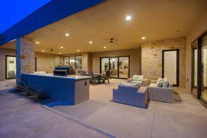 View of patio / terrace with an outdoor hangout area and exterior kitchen