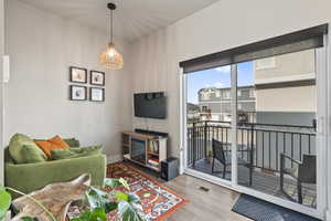 Living room with light wood-type flooring