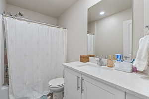 Bathroom with vanity and toilet