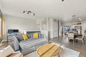 Living room featuring wood-type flooring