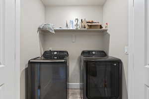 Washroom with washing machine and dryer