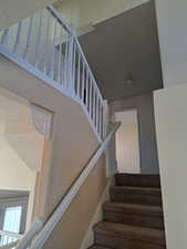 View of Stairs leading up to bedrooms, laundry and primary suite