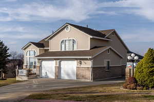 View of front of home featuring a garage