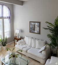 Living room featuring light tile patterned floors