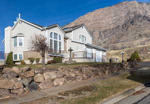 View of front of home featuring a mountain view