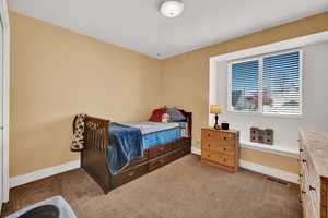 Bedroom 2 with carpet flooring