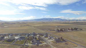 Aerial View from North over a housing area looking at the body of Subject Property