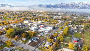 Birds eye view of property with a mountain view