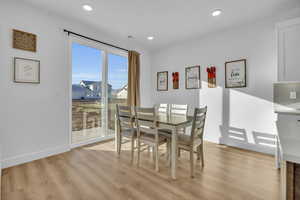 Dining space featuring light wood-type flooring