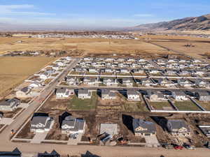 Birds eye view of property with a mountain view