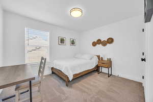 View of carpeted bedroom