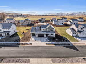 Drone / aerial view featuring a mountain view