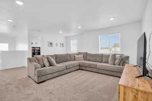 Living room with light colored carpet