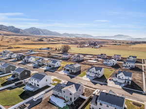 Birds eye view of property with a mountain view