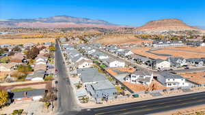 Birds eye view of property with a mountain view