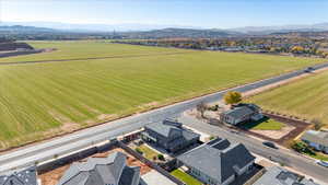 Drone / aerial view featuring a mountain view and a rural view