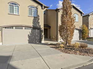 View of front of house with a garage