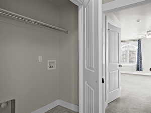 Laundry area with hookup for a washing machine, carpet floors, and ceiling fan