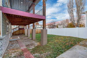 View of yard with a deck