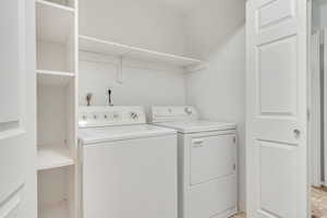 Laundry area with separate washer and dryer