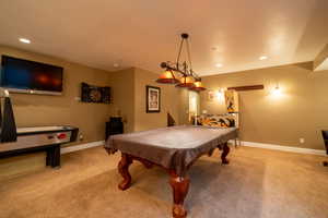 Game room featuring carpet flooring and pool table