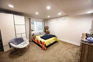 Bedroom featuring carpet flooring