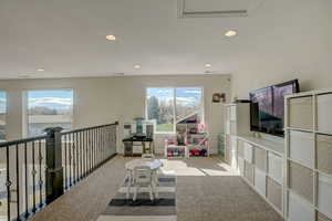 Living room featuring carpet flooring