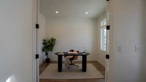 Office space featuring light hardwood / wood-style flooring