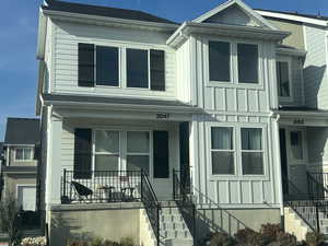 View of front of home featuring covered porch