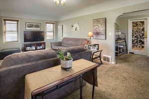 Living room featuring carpet floors