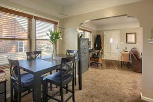 View of carpeted dining area