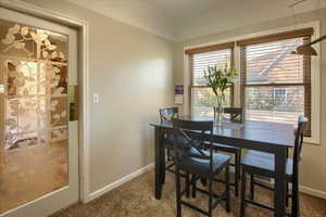 View of carpeted dining area