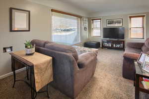 Living room with light carpet