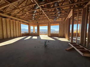 Miscellaneous room with a mountain view and a wealth of natural light